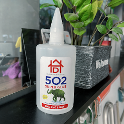 Custom-blended 502 adhesive, available in 30g–500g bottles